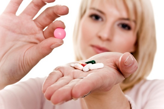 Young women with tablets in hand