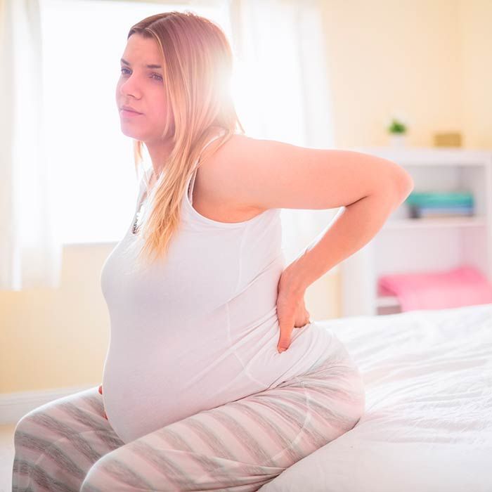 почему болит пупок при беременности