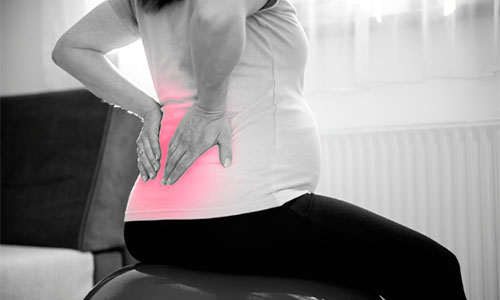 Почему болит спина и поясница при беременности?