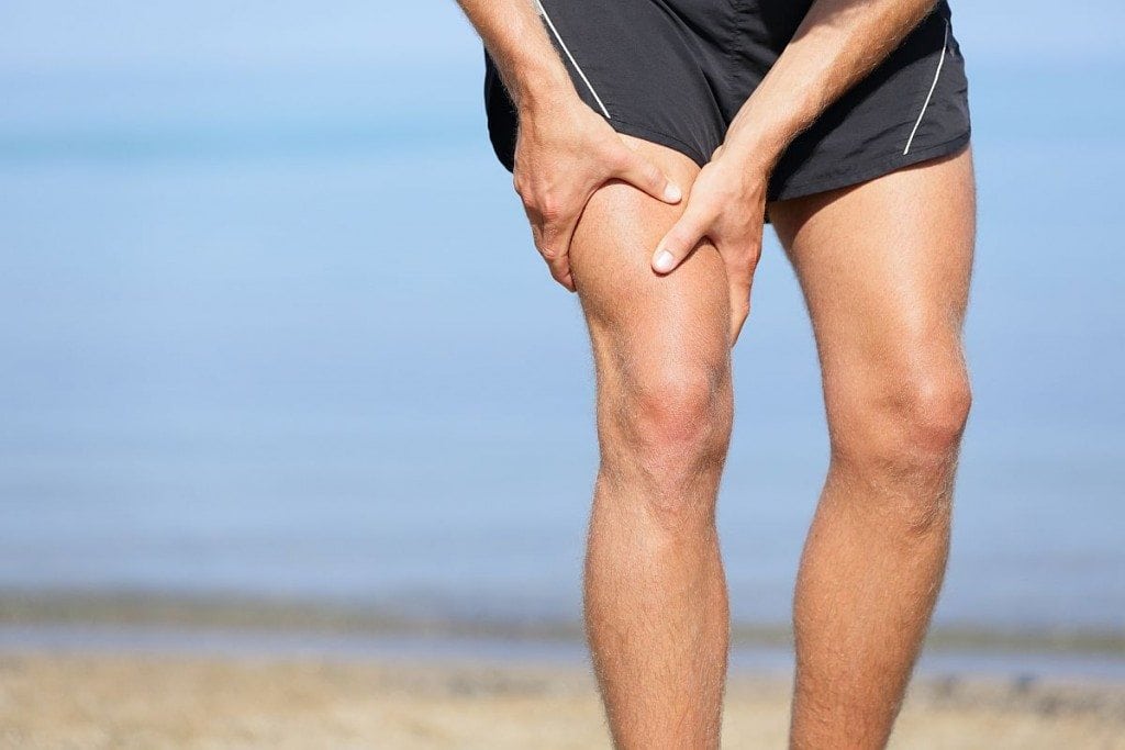 Почему болят мышцы ног выше колен спереди