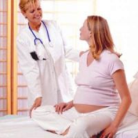 почему болит поясница при беременности